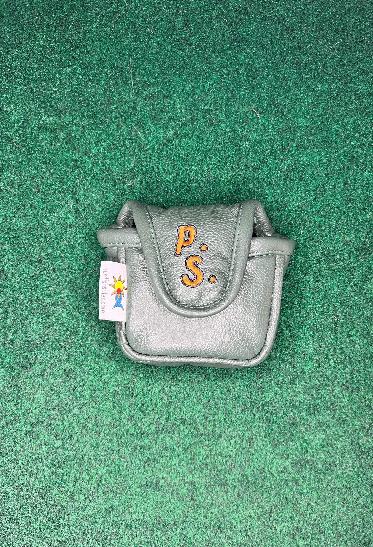 It's a Peach Green Mallet Putter Cover
